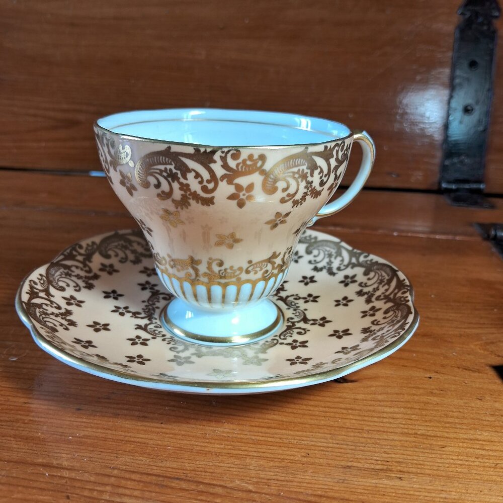Vintage Foley Bone China Teacup and Saucer peach/ beige and gold